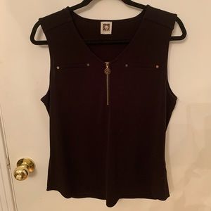 Black top with gold zipper, excellent condition. Bundle and Save!